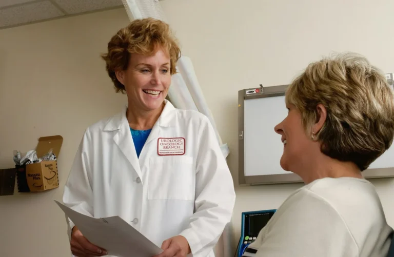 CaRiMed clinician in consultation with a patient
